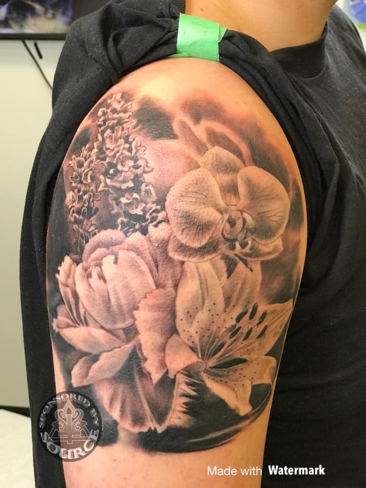 black and grey floral tattoo by mike Thompson hill