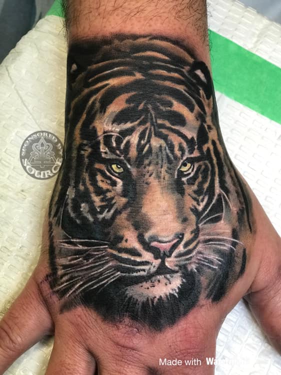 tiger hand tattoo by Mike Thompson hill