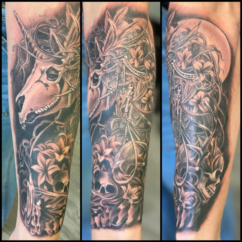 unicorn skull tattoo