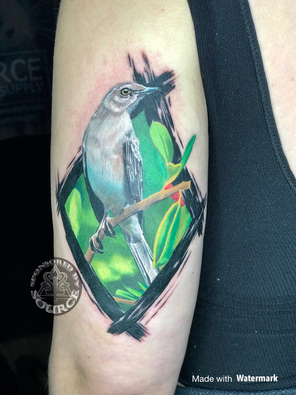 bird tattoo by Mike Thompson Hill